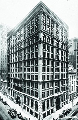 A photograph shows the Home Insurance Building in Chicago.