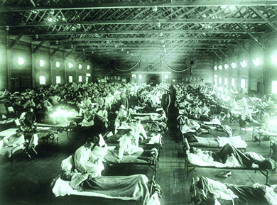 A photograph shows a massive hospital ward filled with flu victims.