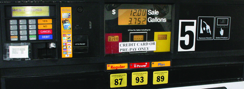 An image of a gas pump that reads “$12.00 Sale, 3.752 Gallons”.