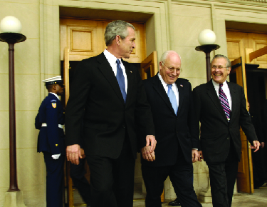 An image of Donald Rumsfeld, George W. Bush, and Dick Cheney walking together.