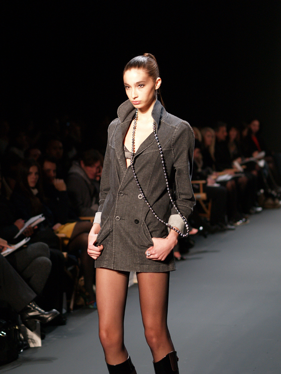 A thin female model is shown participating in New York’s fashion week.